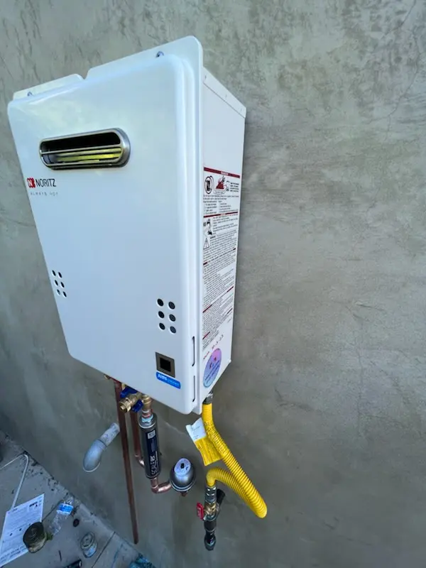 Tankless water heater installation for Villages of Bear Creek homes